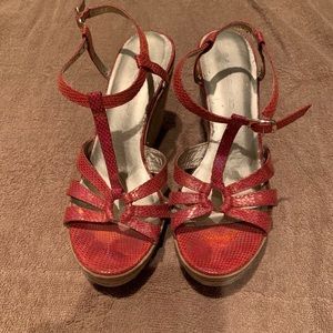 Salmon colored wedges in good condition